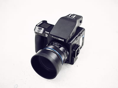 black PhaseOne digital single-lens reflex camera on white background thumbnail