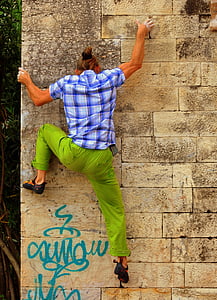 man climbing at wall thumbnail
