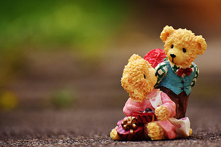 two brown bear figurines thumbnail