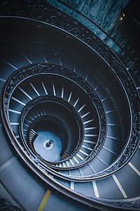 closeup photo of empty spiral staircase thumbnail