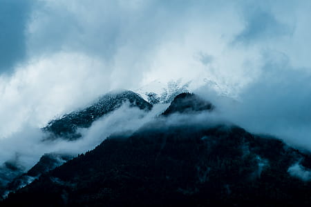 aerial photography of fog covered mountain thumbnail