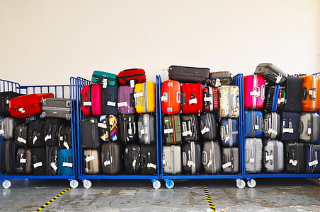 assorted-color luggage thumbnail