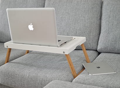 open MacBook on table thumbnail