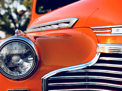 close-up photo of red vehicle thumbnail