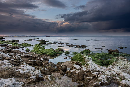 rain clouds over sea thumbnail