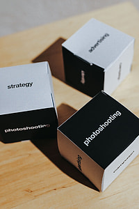Little paper boxes with words on them thumbnail