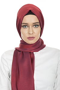 woman in white top and red headscarf thumbnail