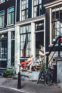 two person sitting near door \ thumbnail