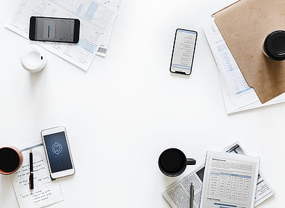 aerial photo of phones and papes on able thumbnail