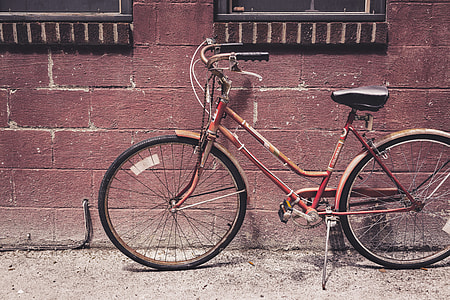brown rigid bike near the concrete wall thumbnail
