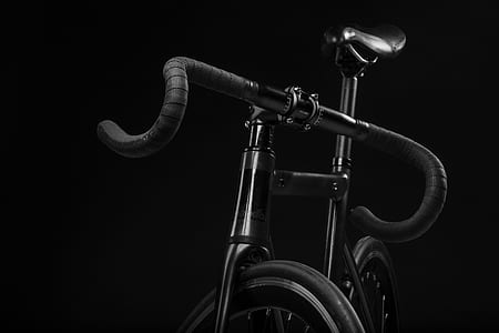 shallow focus photography of black road bike thumbnail
