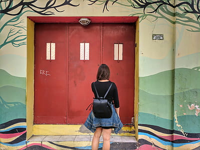 woman standing near door thumbnail