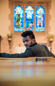 man wearing black long-sleeved top thumbnail