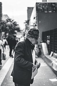 Man Holding Paper thumbnail