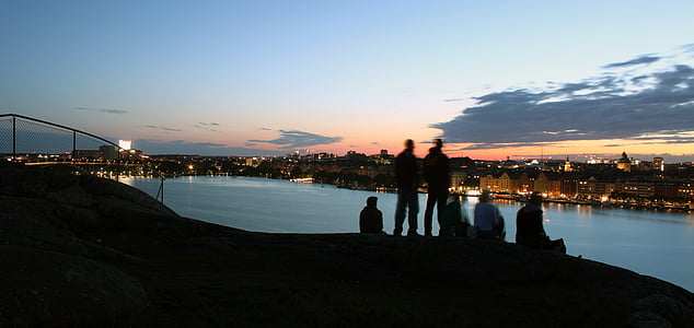 people overlooking on body of water during daytime thumbnail