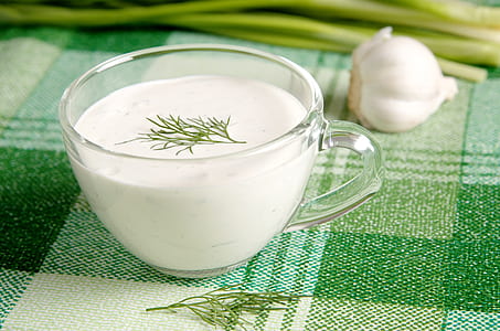 clear glass cup and white garlic valve thumbnail