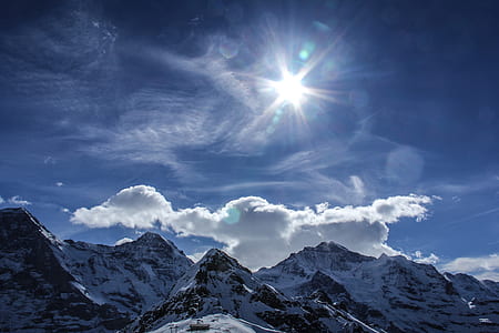 snowy mountain during day time thumbnail
