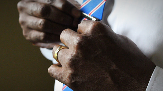 person wearing gold ring thumbnail