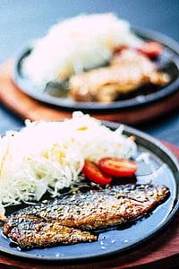 fried fish on sizzling plate thumbnail