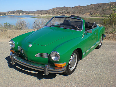 parked green convertible thumbnail