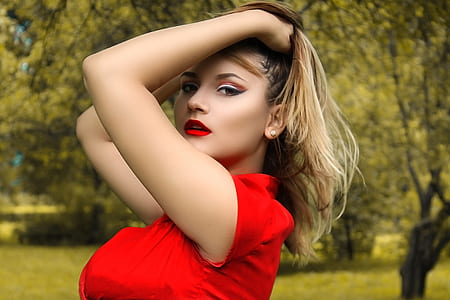 woman holding her hair thumbnail