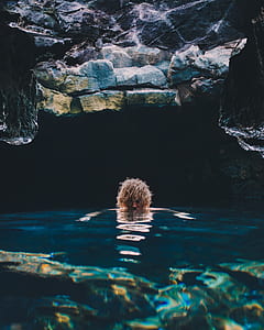 person on body of water thumbnail