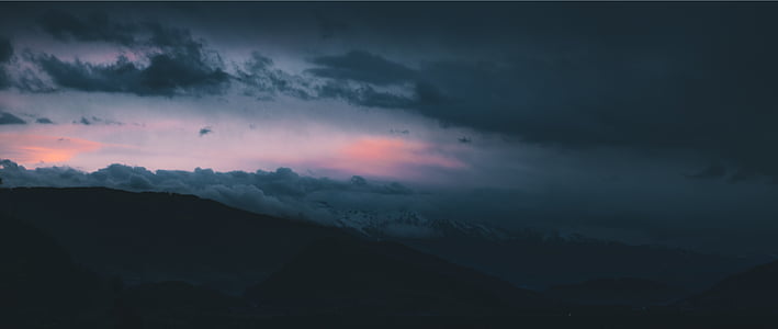 landscape photography of grayscale cloudy sky thumbnail