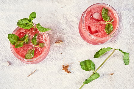 two beverage glasses on white cloth thumbnail