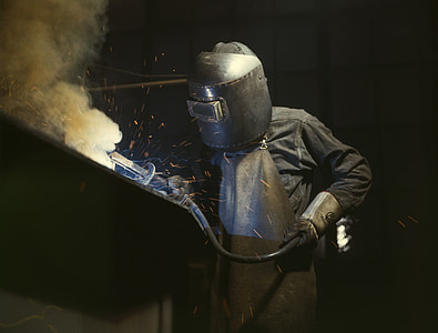 person wearing black welding mask thumbnail