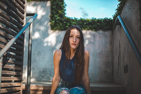 woman sitting on stair outdoors thumbnail
