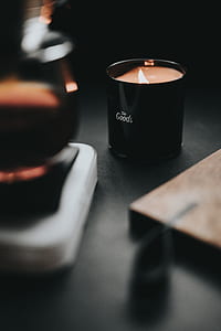 selective focus photography of scented candle thumbnail