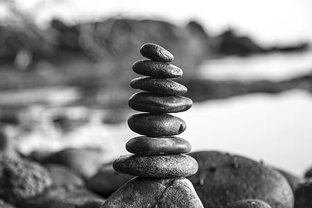 grayscale photo of stones stacked together thumbnail