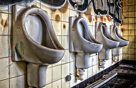 four gray ceramic urinals thumbnail