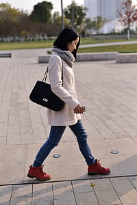 woman walking on street thumbnail