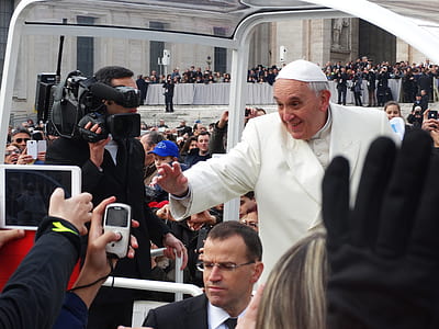 Pope Francis surrounded with people at daytime thumbnail