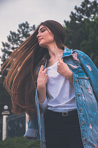 woman wearing white shirt and blue denim jacket thumbnail