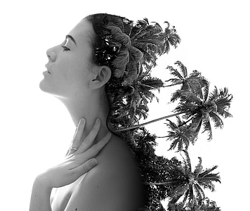 gray scale of woman and palm tree on his back art poster thumbnail