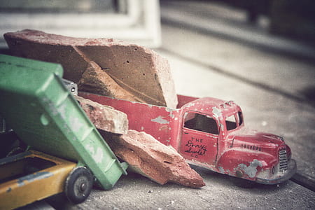 red truck toy with stones thumbnail