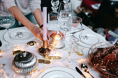 Hands Decorating Christmas Table thumbnail