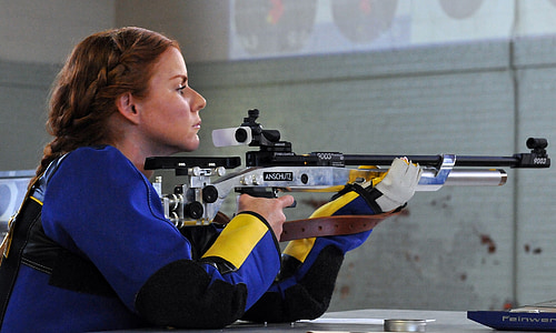 woman holding rifle thumbnail