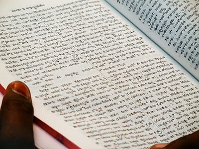 person holding book thumbnail