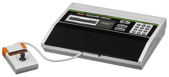 black and gray game console with controller thumbnail