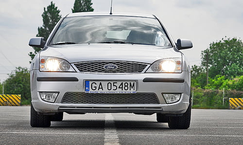 silver Ford Focus on road thumbnail