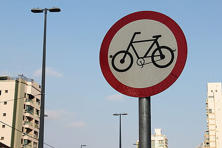 person showing bicycle road signage thumbnail