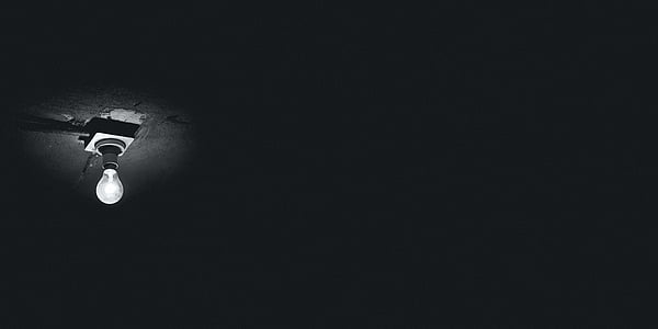 grayscale photo of light bulb on ceiling thumbnail