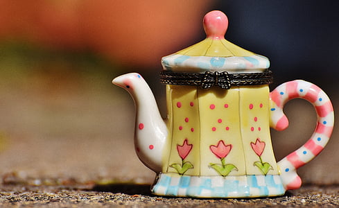 selective focus photography of yellow teapot thumbnail
