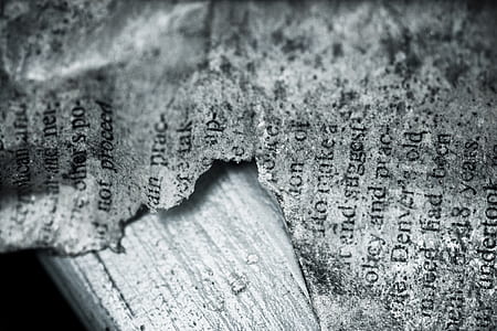 burnt piece of paper on white top table thumbnail