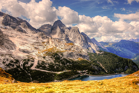 landscape photography of mountain near body of water thumbnail