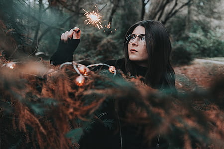 woman holding sparklers thumbnail