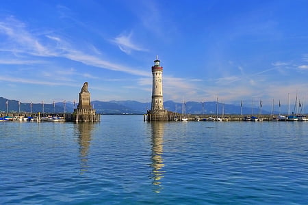 lighthouse in the middle of sea thumbnail